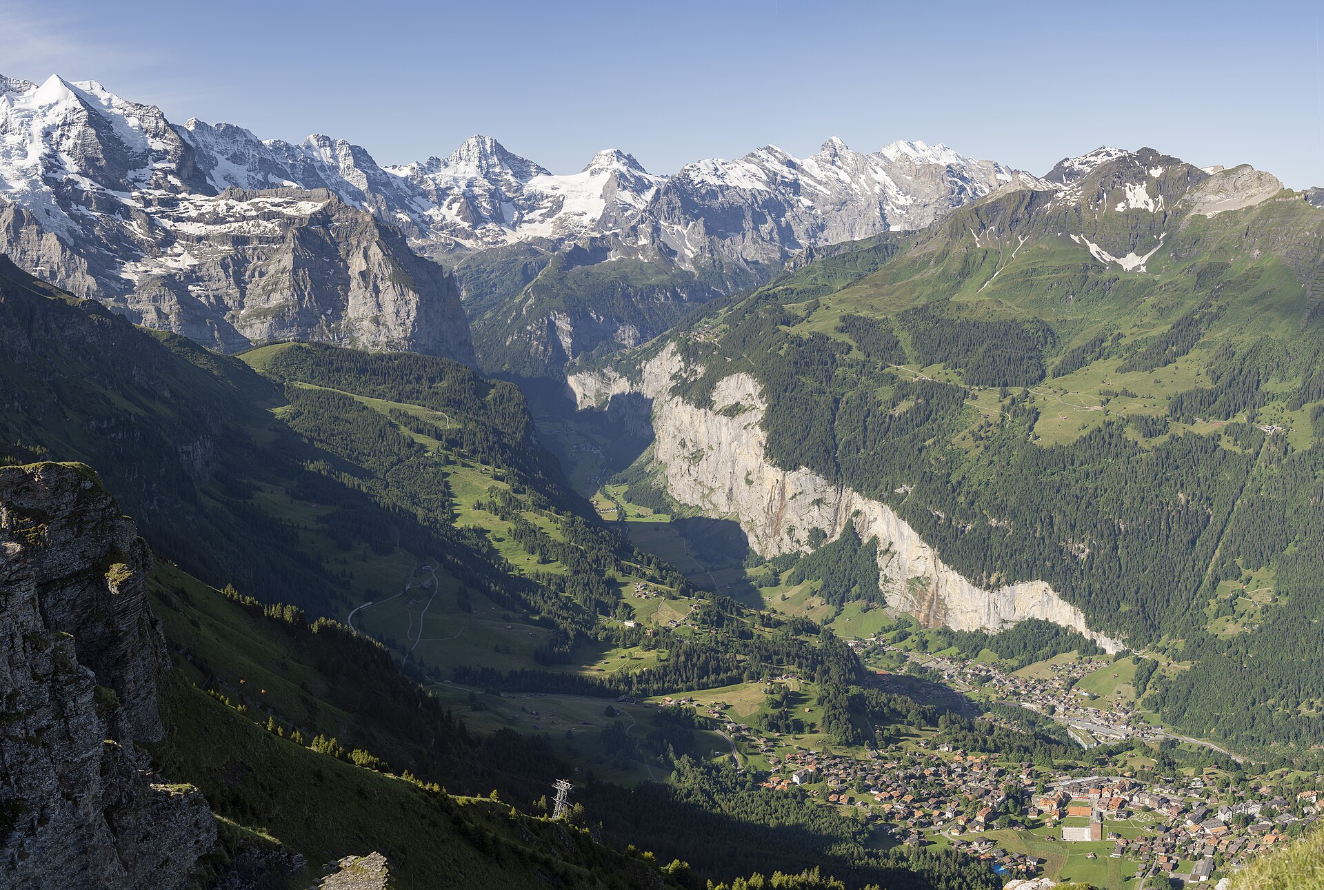 Lauterbrunnen valley with waterfalls cascading from cliffs